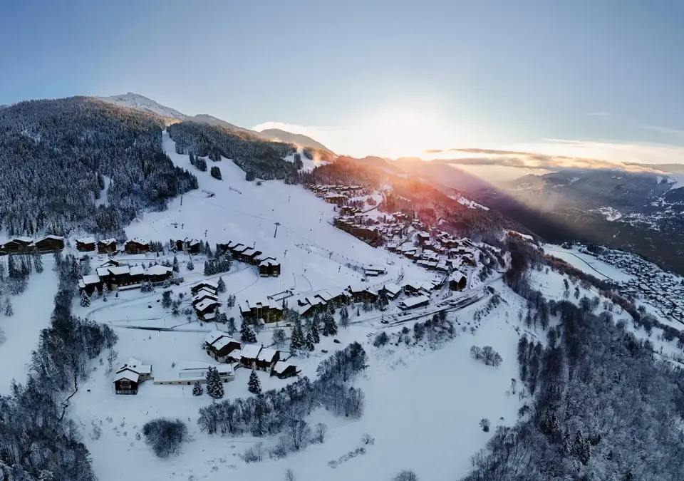 Montalbert sunrise whole village view credit BrendanLePeru-La_Plagne