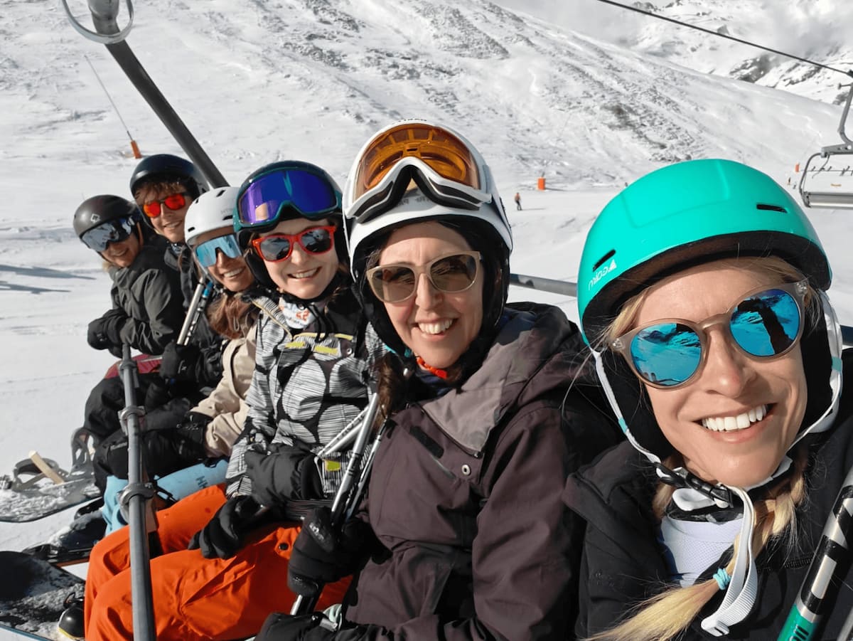 Peak Retreats Team Members On Chairlift In Tignes