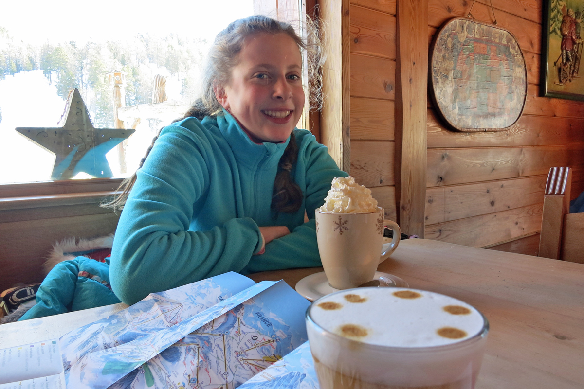 Enjoying hot chocolate at Chalet Montsoleil Claviere in Italy