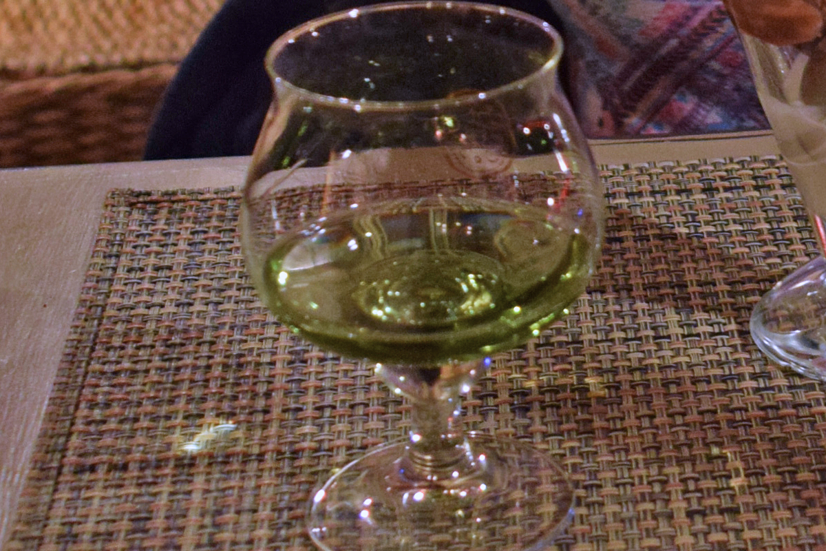 Top food to eat when skiing in the French Alps: A glass of genepi