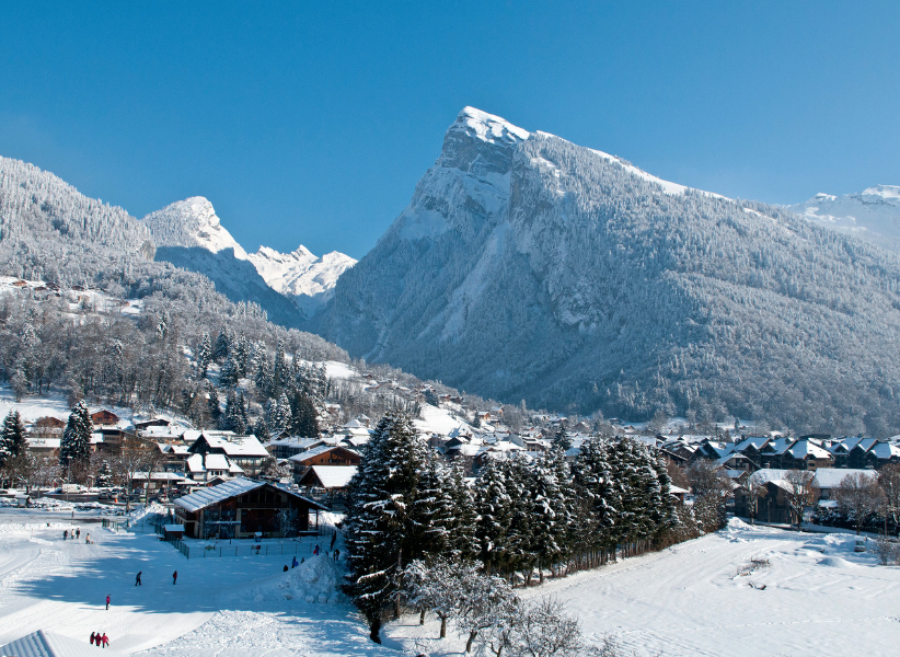 The stunning setting of Samoens surrounded by snow-capped peaks. Image credit: Samoëns - Christian Martelet
