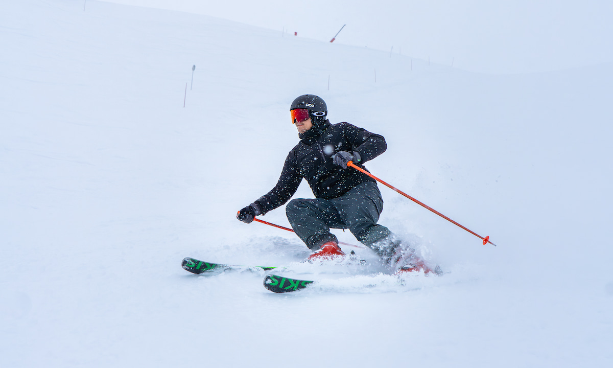 A man skiing wearing ADN skis