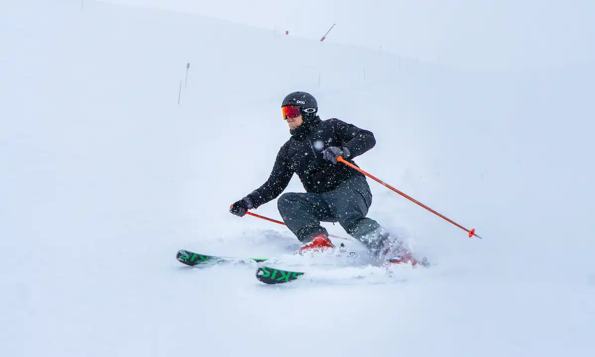 A man skiing wearing ADN skis