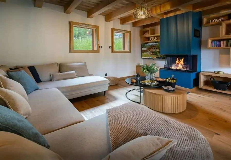 Chalet Lezopea, Samoens (self catered chalet) - Seating area with fireplace