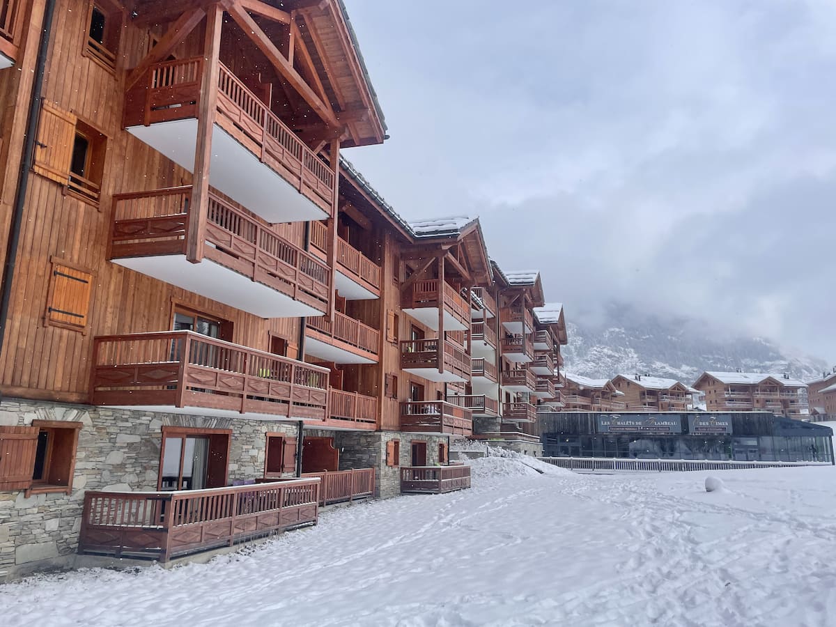 Back Of Chalets De Flambeau In The Snow (1)