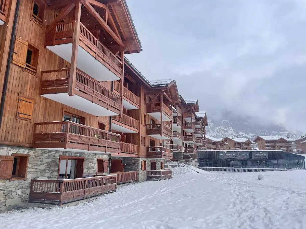 Back Of Chalets De Flambeau In The Snow (1)