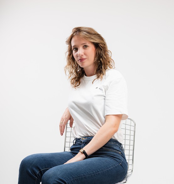 Camille Lambert, Founder of ADN sat down looking at camera