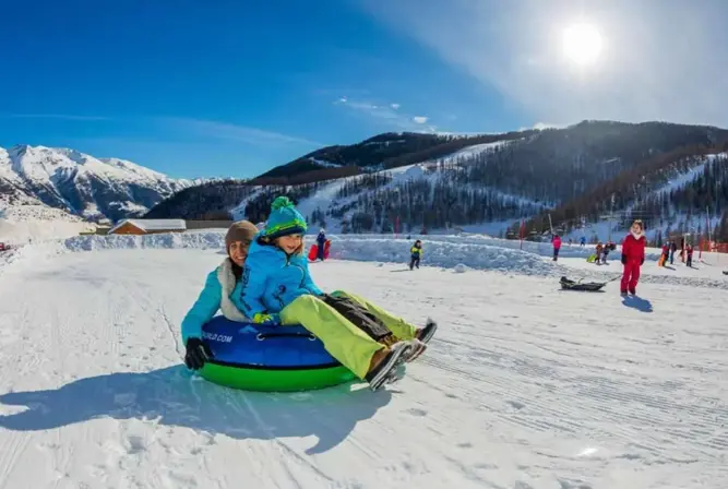 Auron - Snow tubing.webp